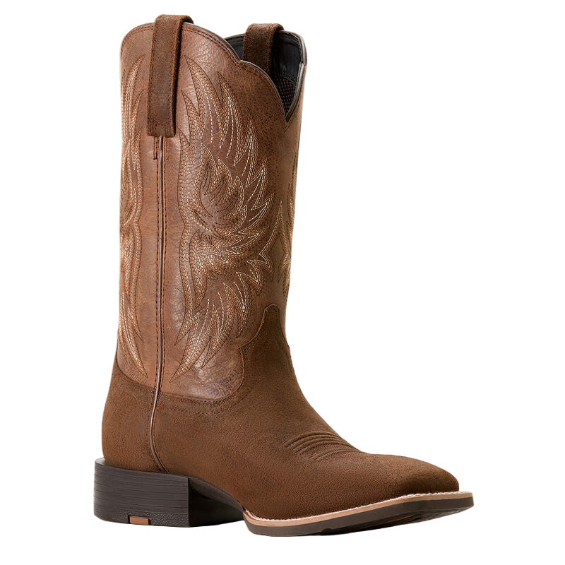 Brown cowboy boot with intricate design on a white background