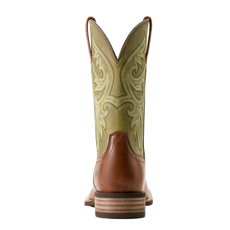Green and brown cowboy boot on a white background