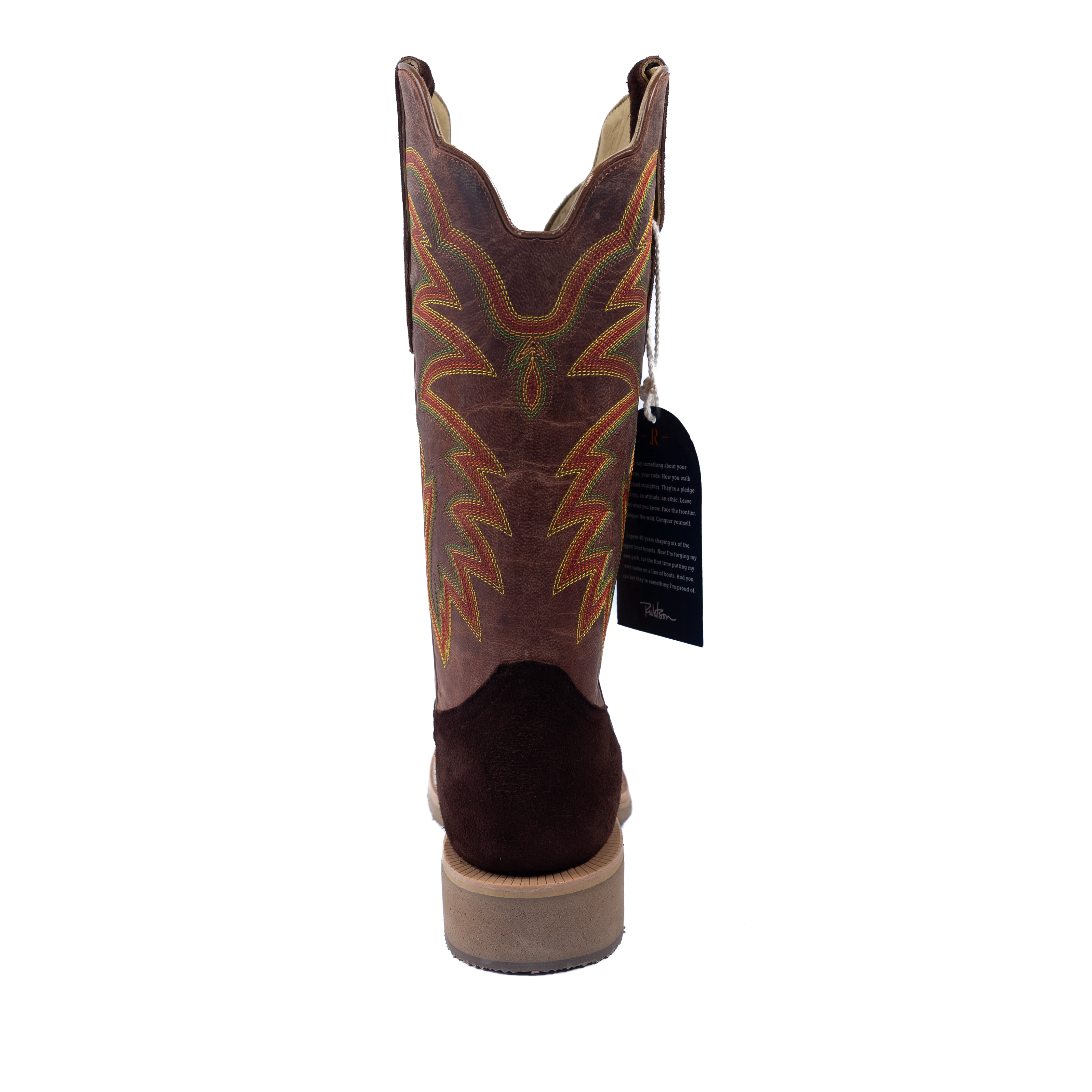Brown cowboy boot with decorative stitching on a white background