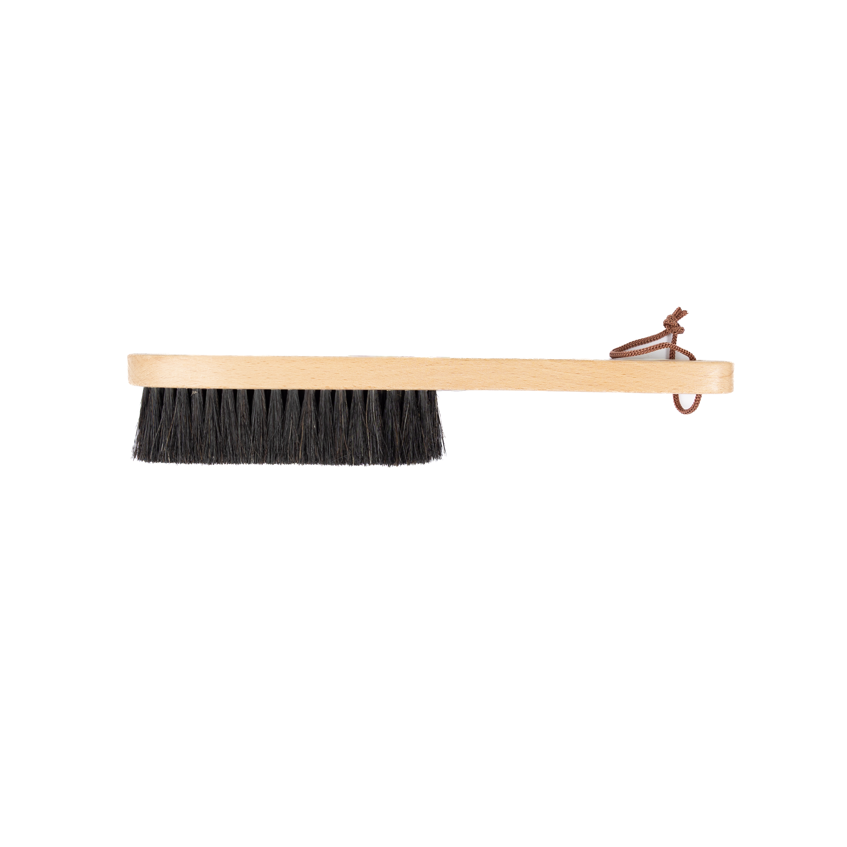 Brush with black bristles and wooden handle on a white background