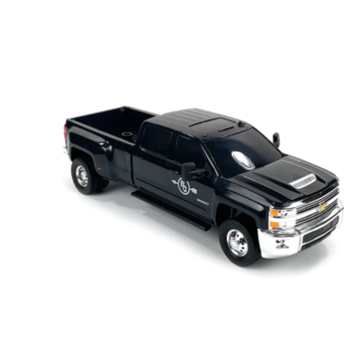 Black toy truck on a white background