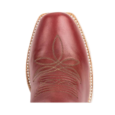 Close-up of a red cowboy boot with intricate stitching on a light gray background