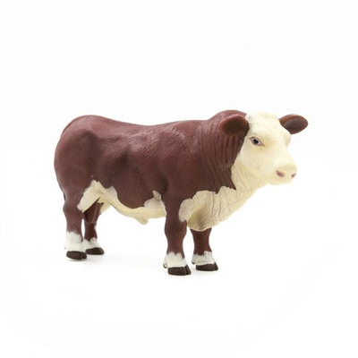 Model of a cow on a white background