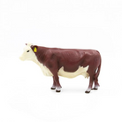 Model of a cow on a white background
