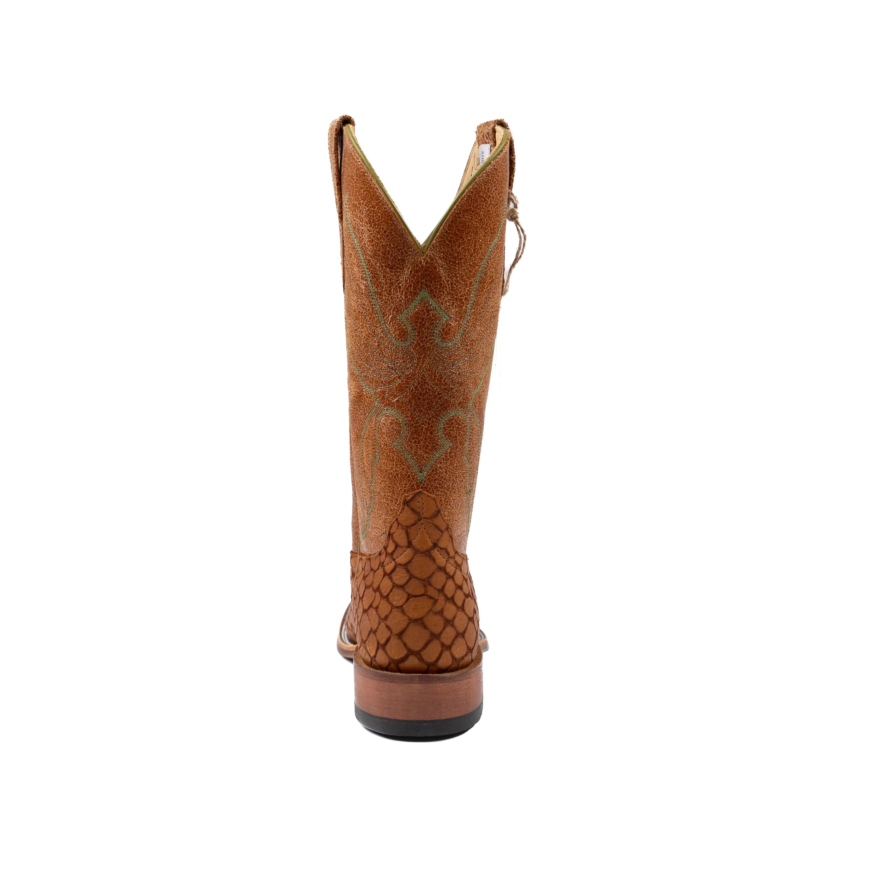 Brown cowboy boot with embossed pattern on a white background