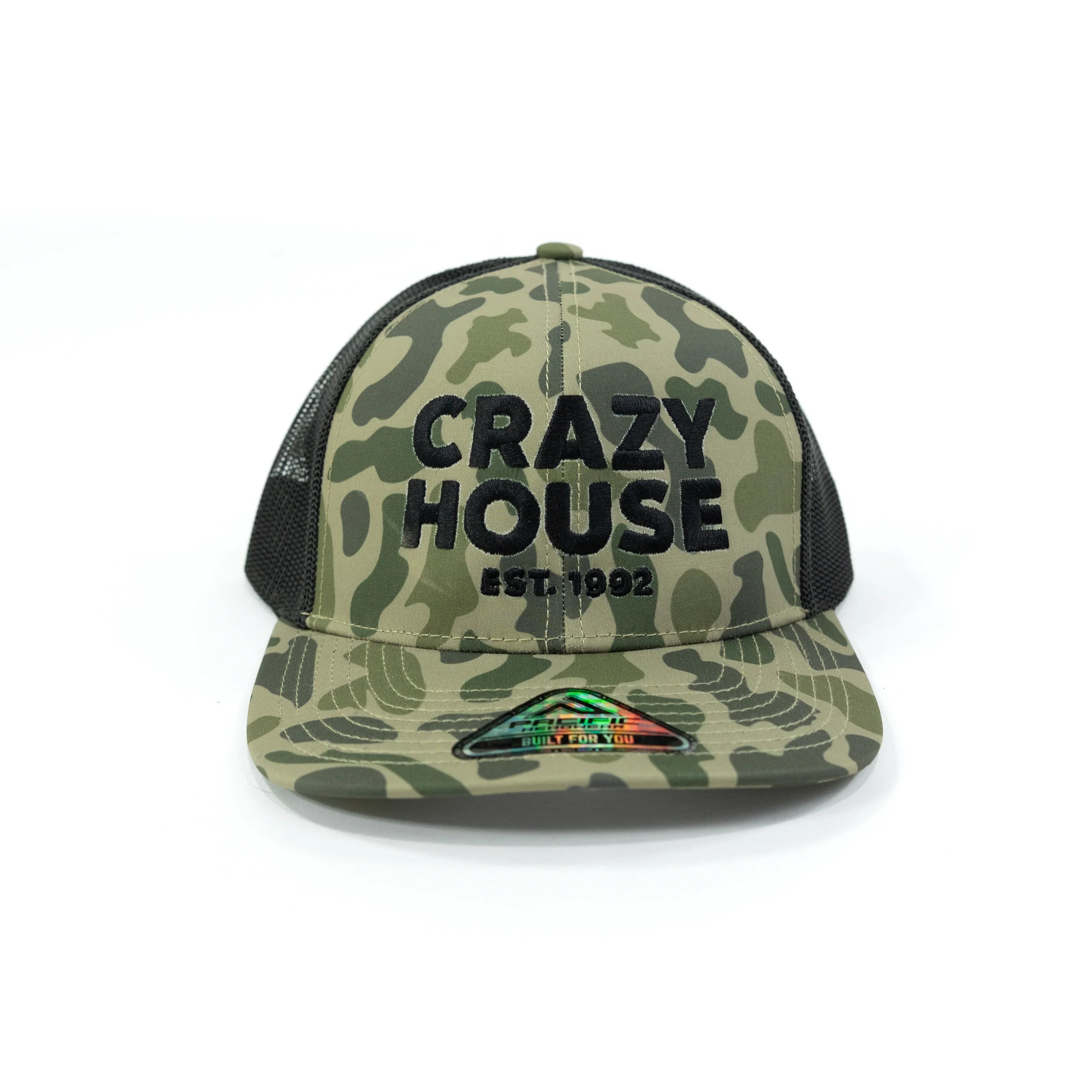 Camouflage cap with 'Crazy House' text on a white background