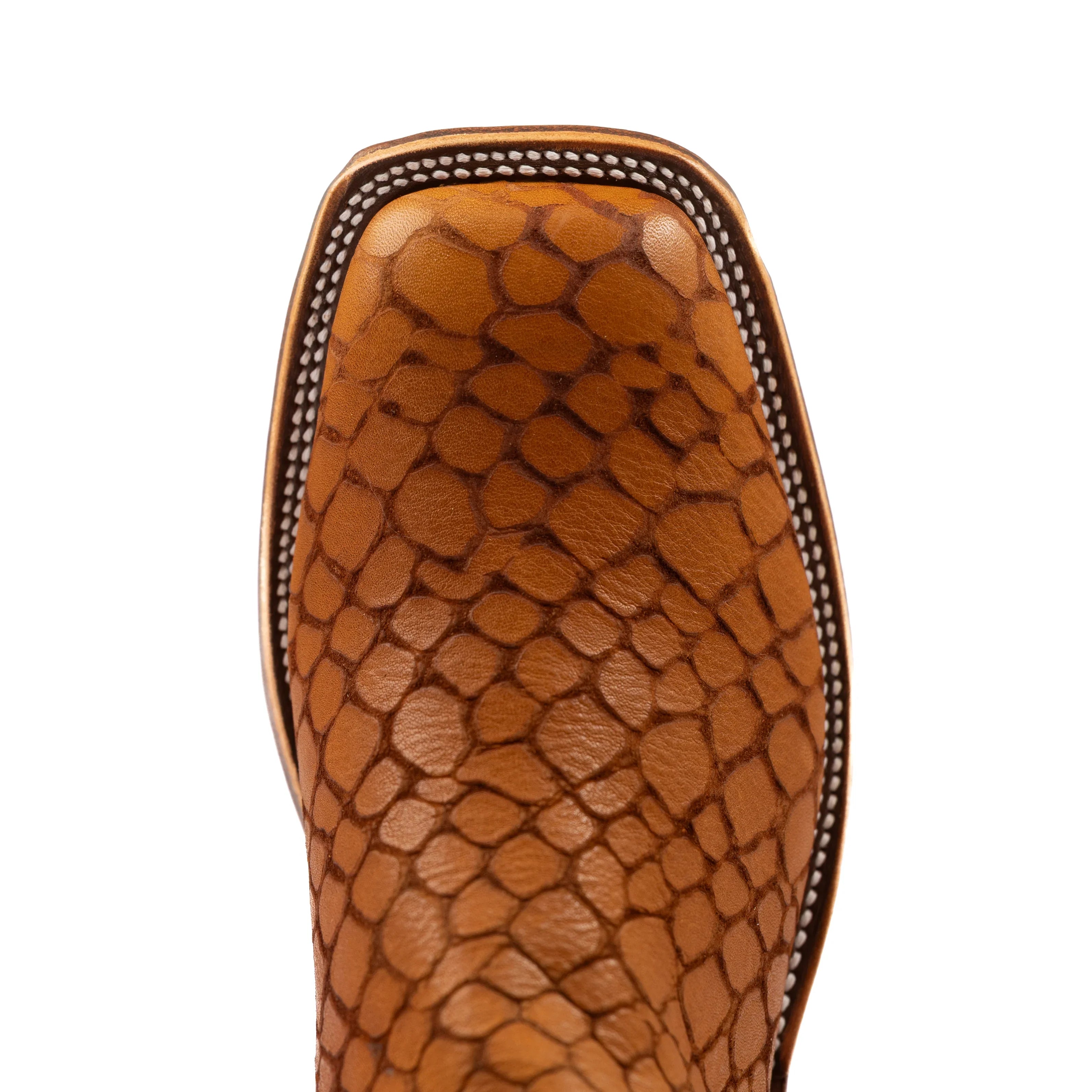 Close-up of a brown leather sandal sole with detailed texture on a white background