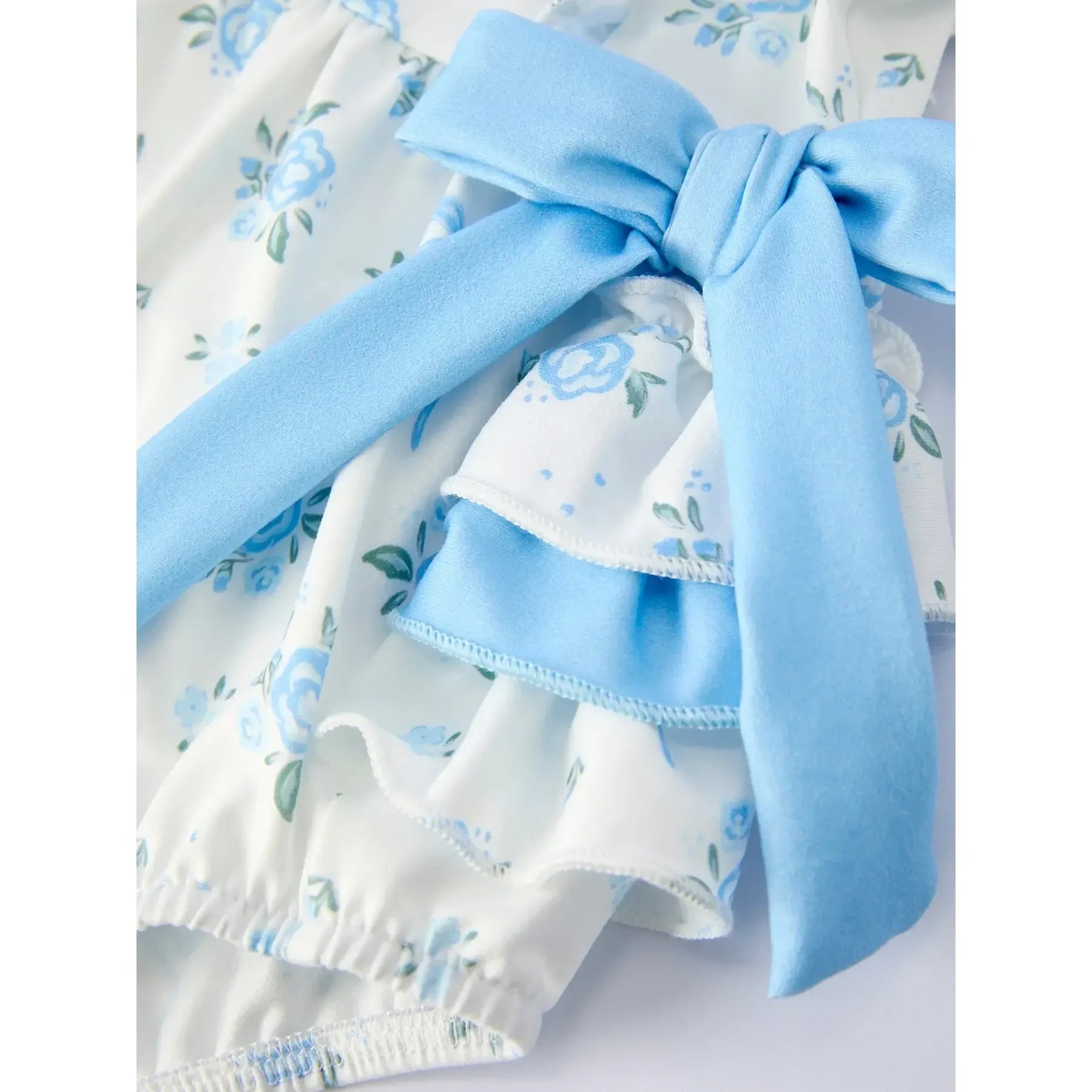 Girl's Blue Floral and Bow Ruffle Onesie