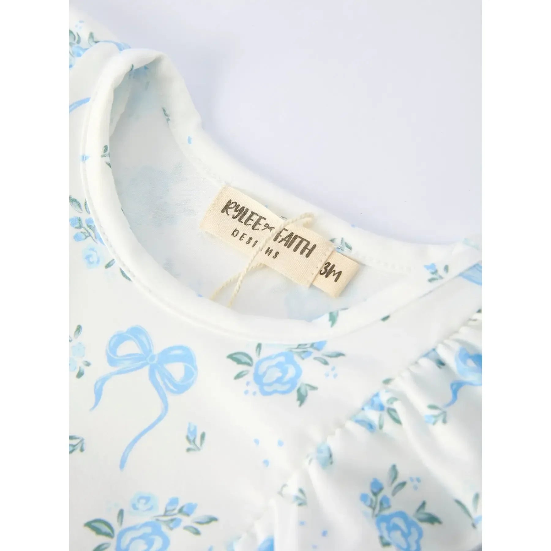 Girl's Blue Floral and Bow Ruffle Onesie