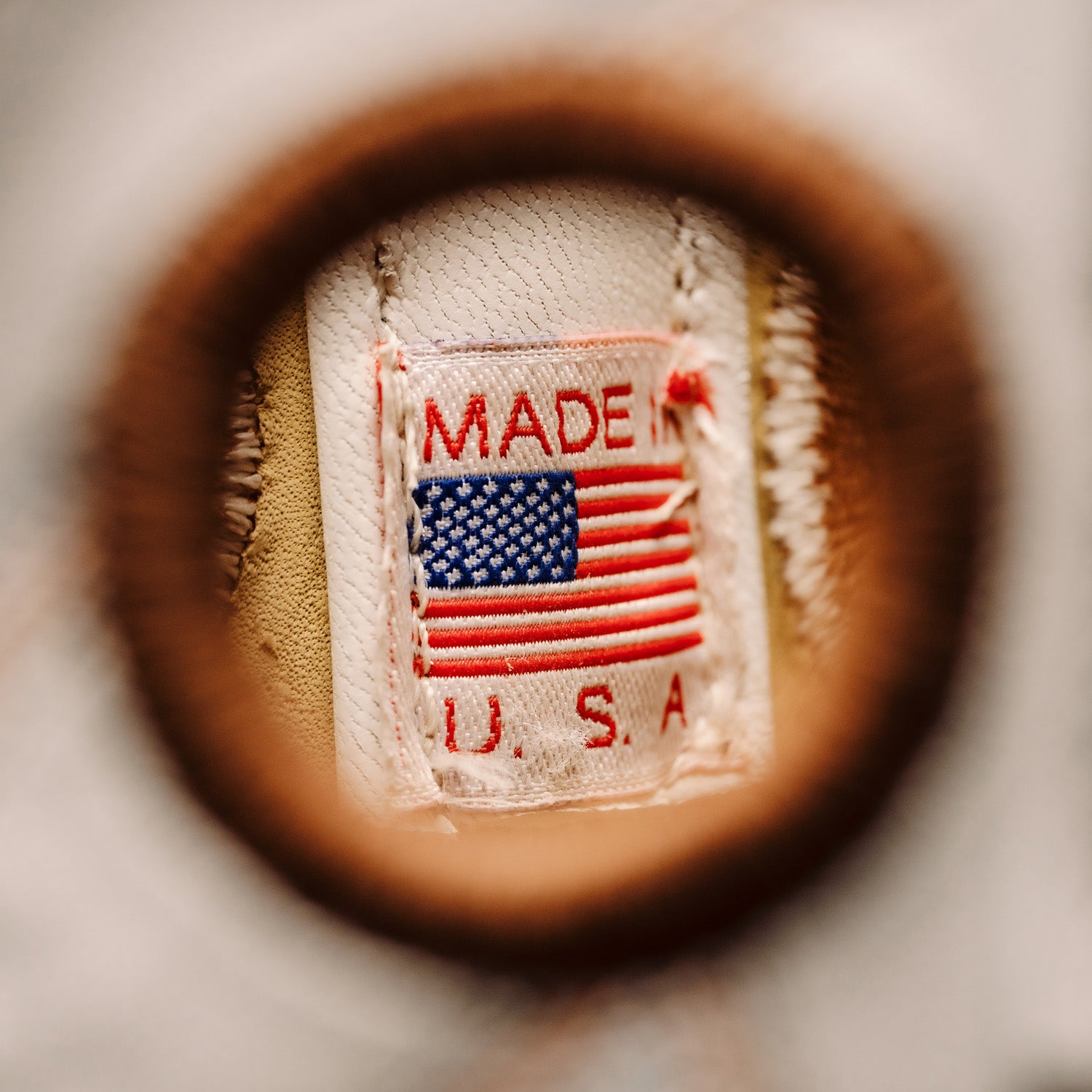 Close-up of a 'MADE IN U.S.A.' label on fabric.