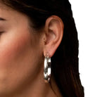 Women's West & Co 2" Silver Aztec Stamped Hoop Earrings E700