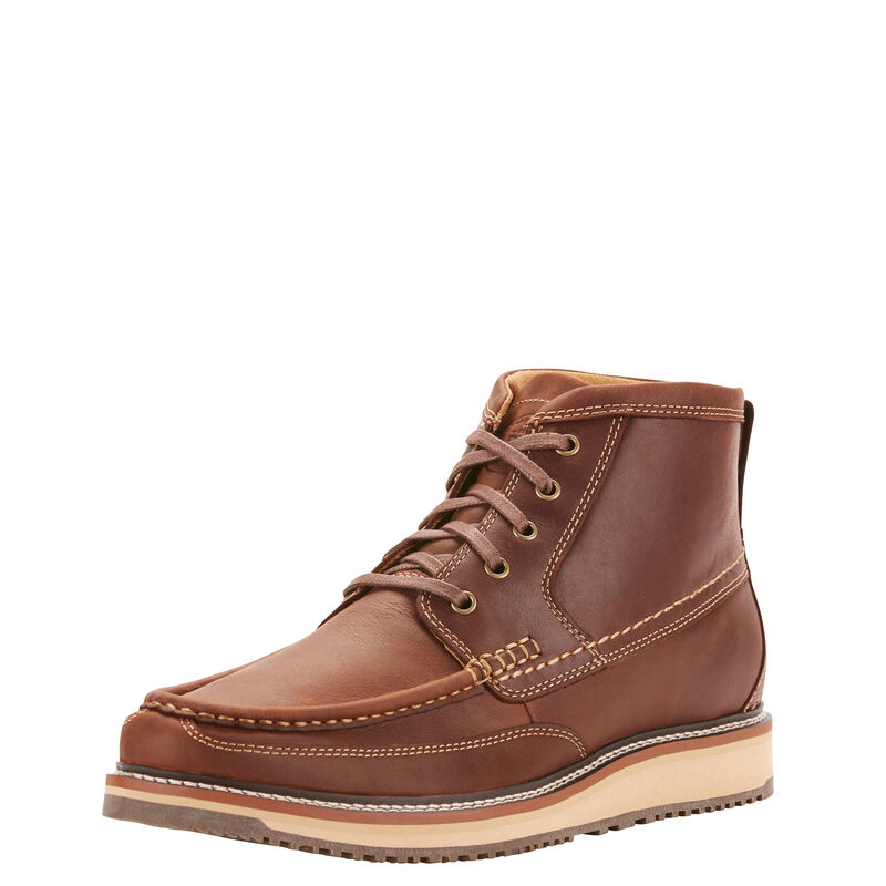 Brown leather boot on a white background