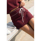 Women's Contrast Piping Mini Skirt with Overlay Panel and Tie Detail A4707