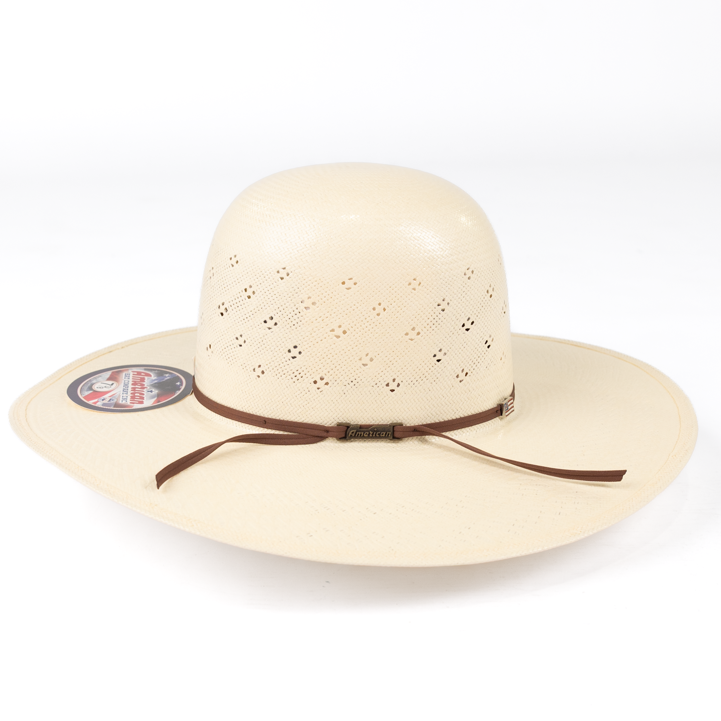 Beige sun hat with a brown ribbon on a white background