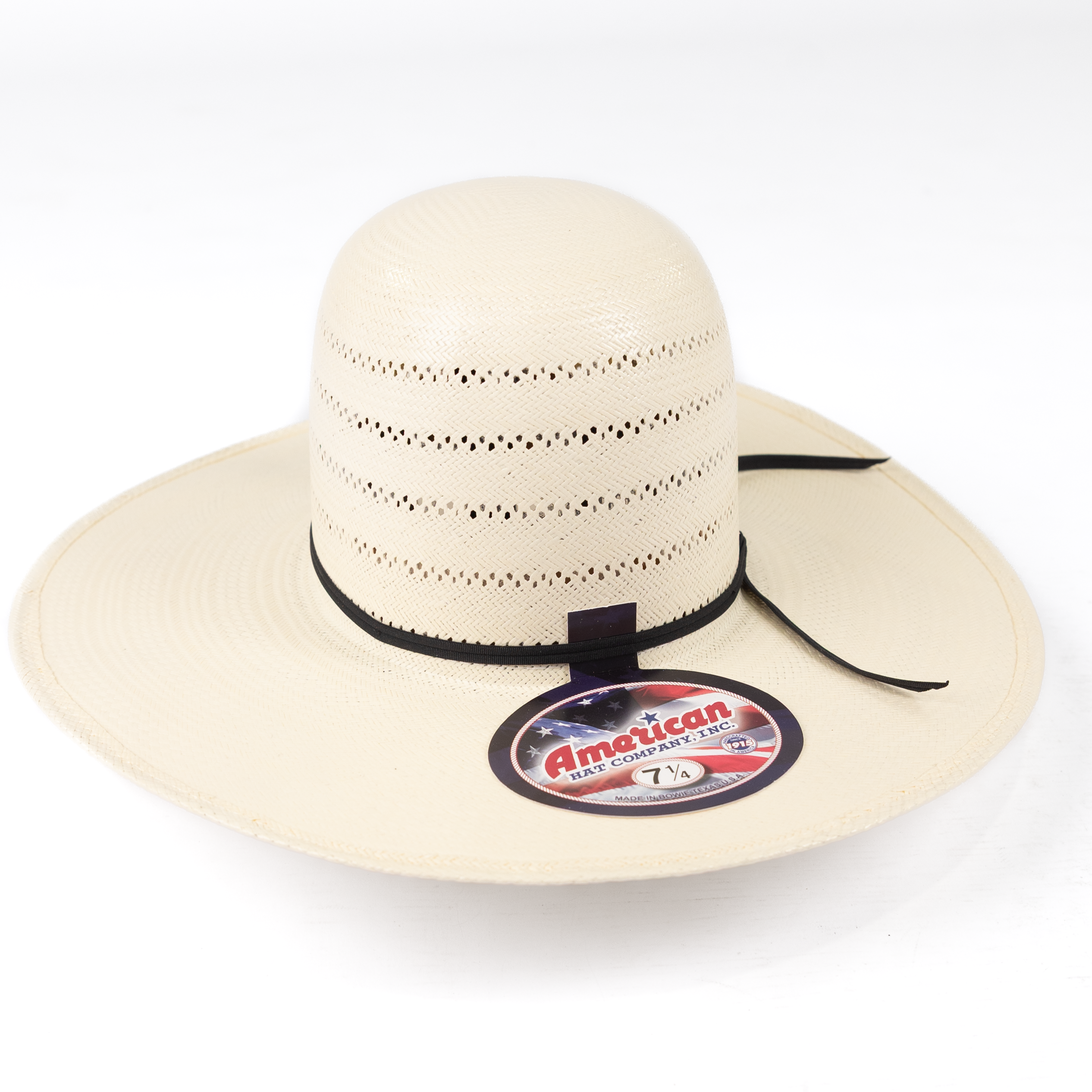 Beige sun hat with a black band on a white background