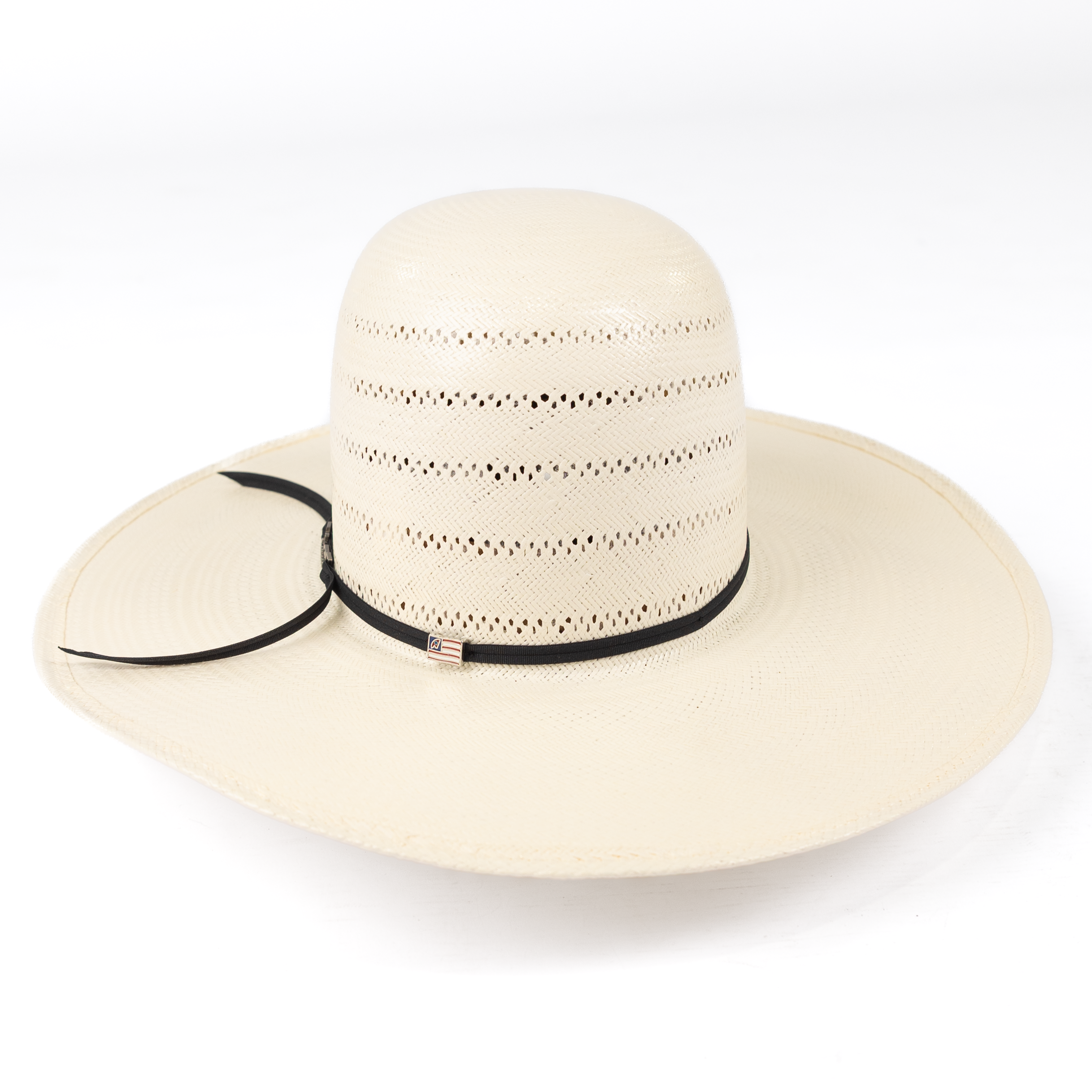 Beige straw hat with black band on a white background