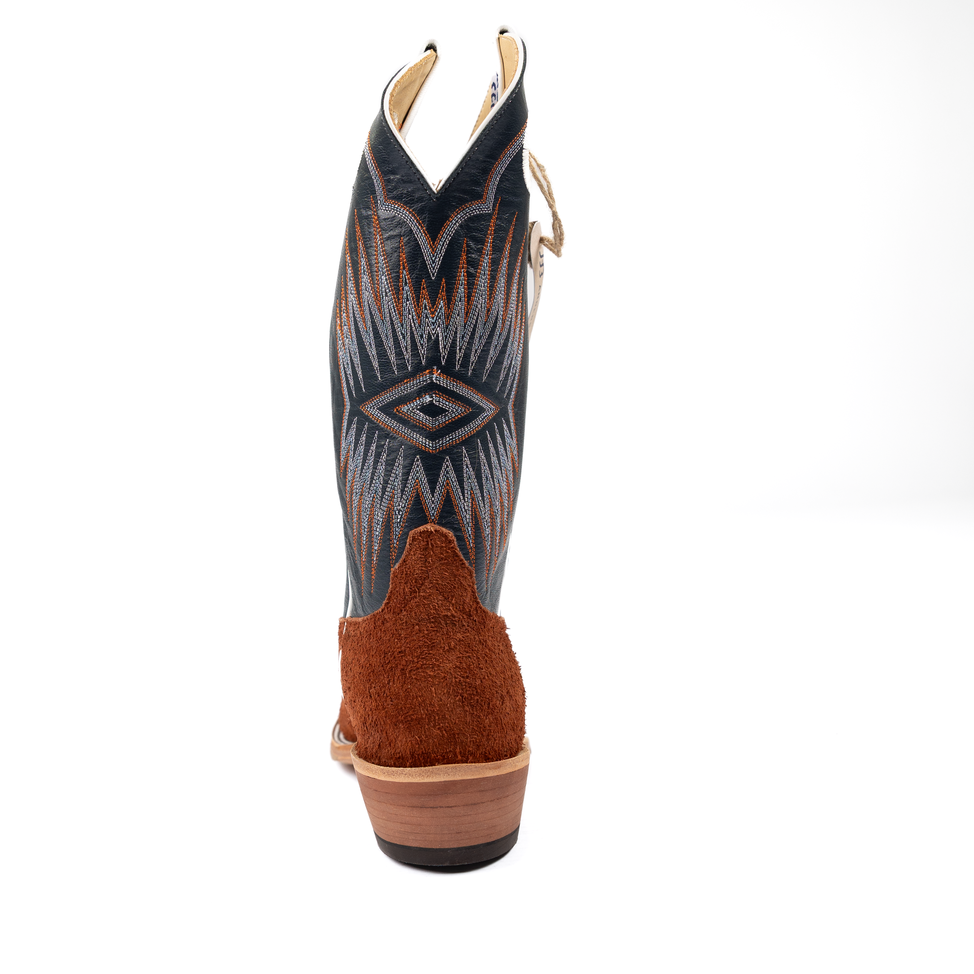 Cowboy boot with geometric pattern on a white background