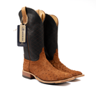 Pair of brown cowboy boots with a black insole on a white background