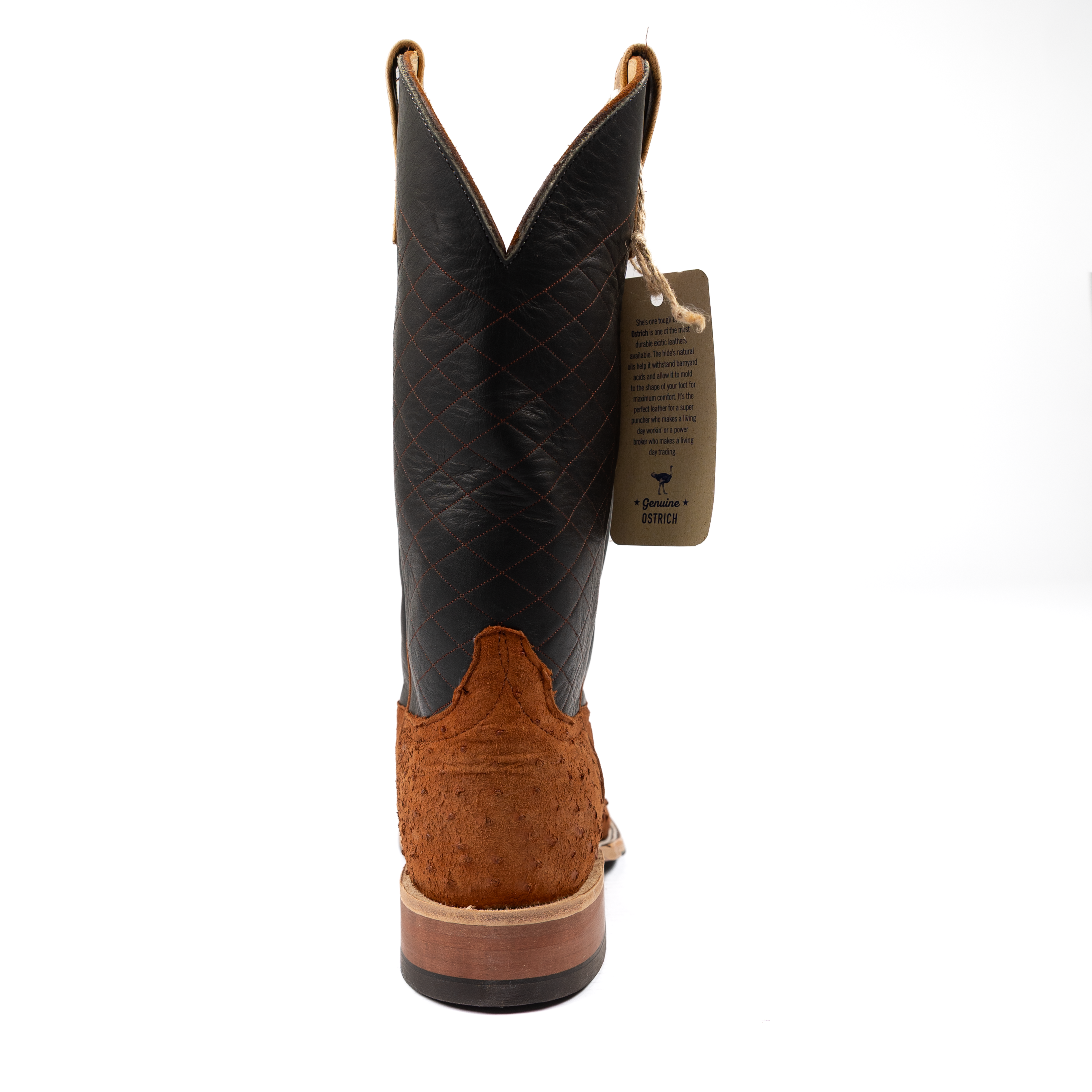 Black and brown cowboy boot with a visible brand tag on a white background