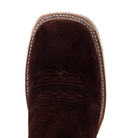 Close-up of a brown suede boot sole on a white background