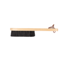 Brush with black bristles and wooden handle on a white background