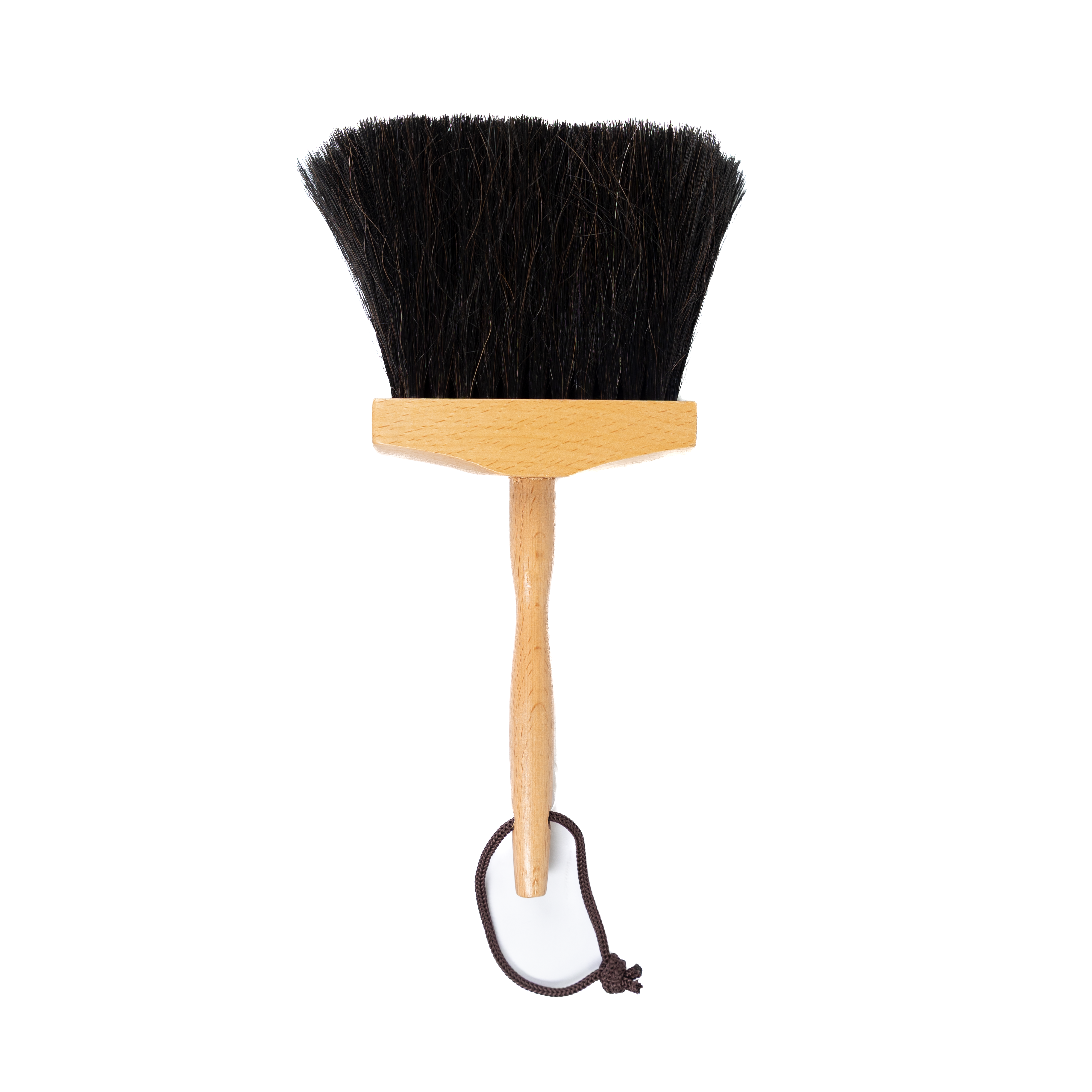 Black bristle brush with wooden handle on a white background
