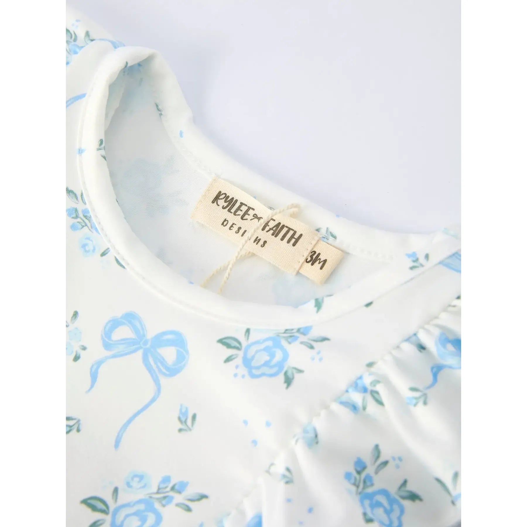 Girl's Blue Floral and Bow Ruffle Onesie 
