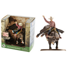 Cowboy toy figure on a bull with packaging on a white background