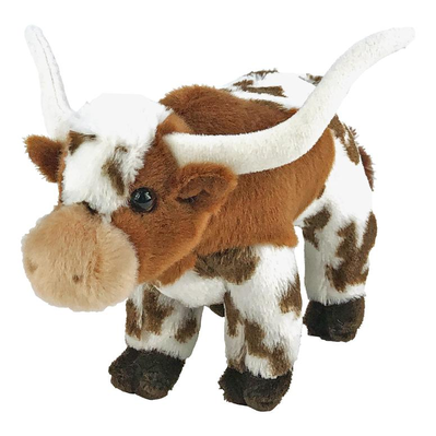 Plush toy longhorn cow on a white background