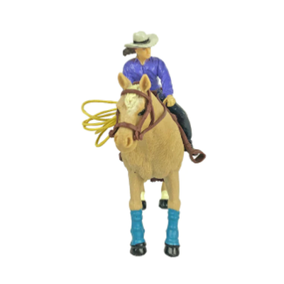 Figurine of a person riding a horse on a white background