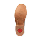 Brown leather shoe sole with a visible brand logo on a light gray background
