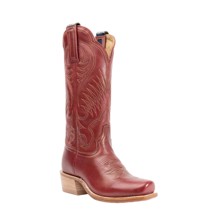 Red cowboy boot with intricate stitching on a white background