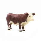 Model of a cow on a white background