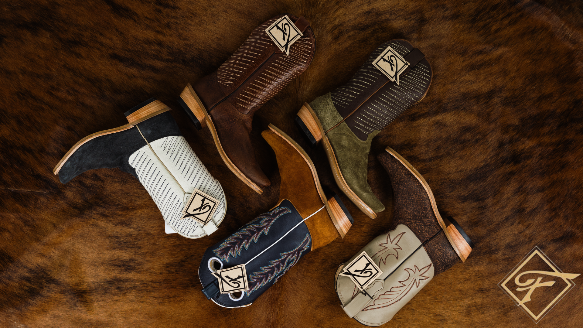 Collection of leather golf club covers on a wooden surface