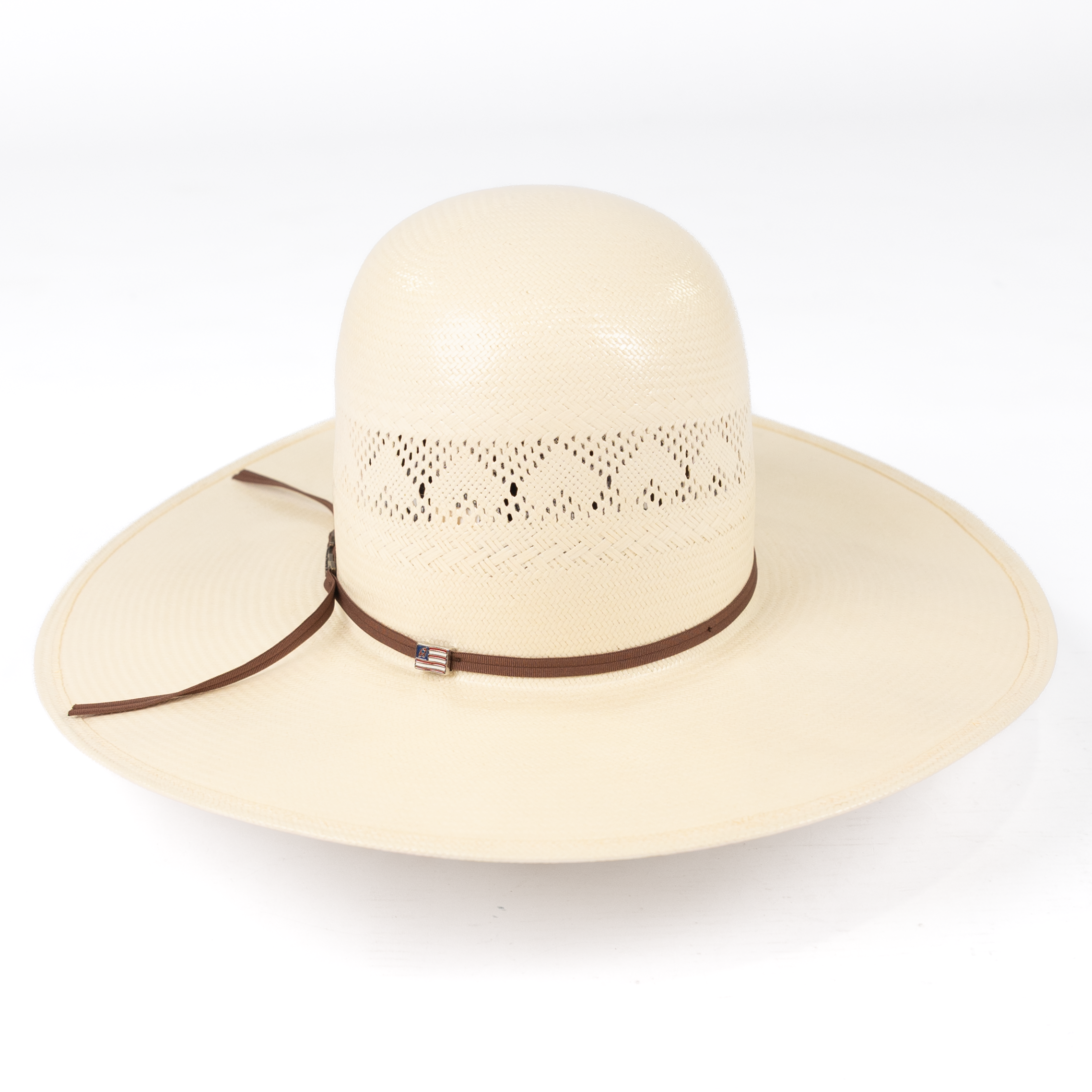 Beige sun hat with brown band on a white background