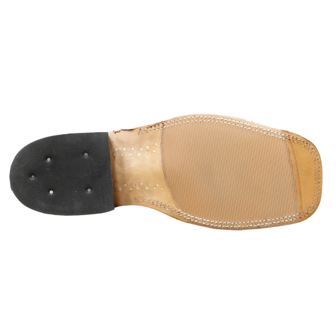Shoe sole with black rubber and beige leather on a white background